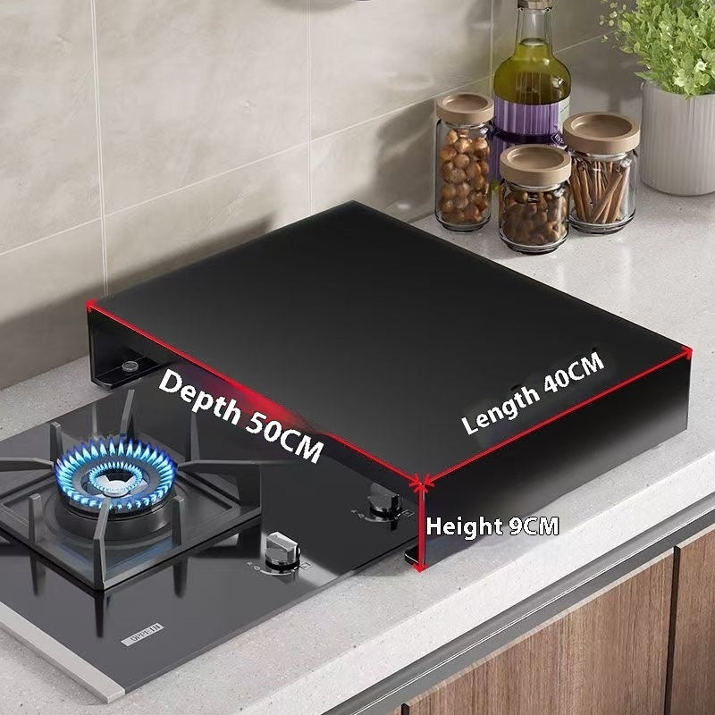 Induction cooker pot shelf with a pot on a gas stove, wooden cutting board, and fresh tomatoes in a modern kitchen.
