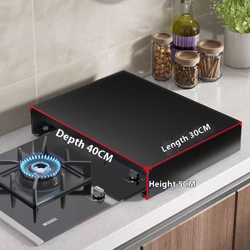 Induction cooker pot shelf with a pot on a gas stove, wooden cutting board, and fresh tomatoes in a modern kitchen.