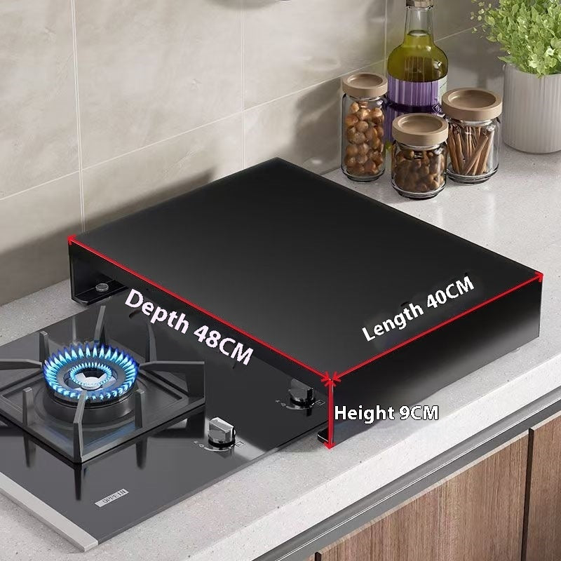 Induction cooker pot shelf with a pot on a gas stove, wooden cutting board, and fresh tomatoes in a modern kitchen.